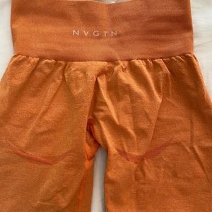 Orange NVGTN contour shorts